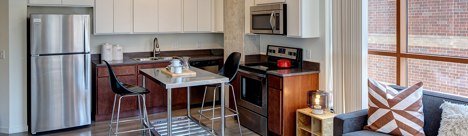 Furnished apartment featuring an open floor plan