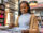 Young woman shopping for records