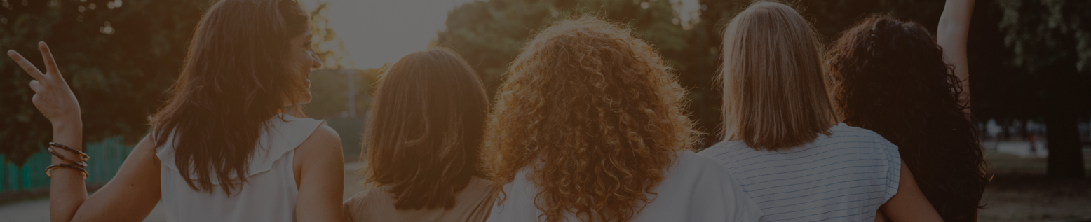 A group of women seen from behind.